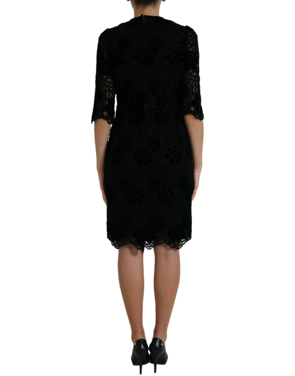 Black floral lace cotton bodycon dress by Dolce & Gabbana, featuring a fitted silhouette and intricate lace detailing.