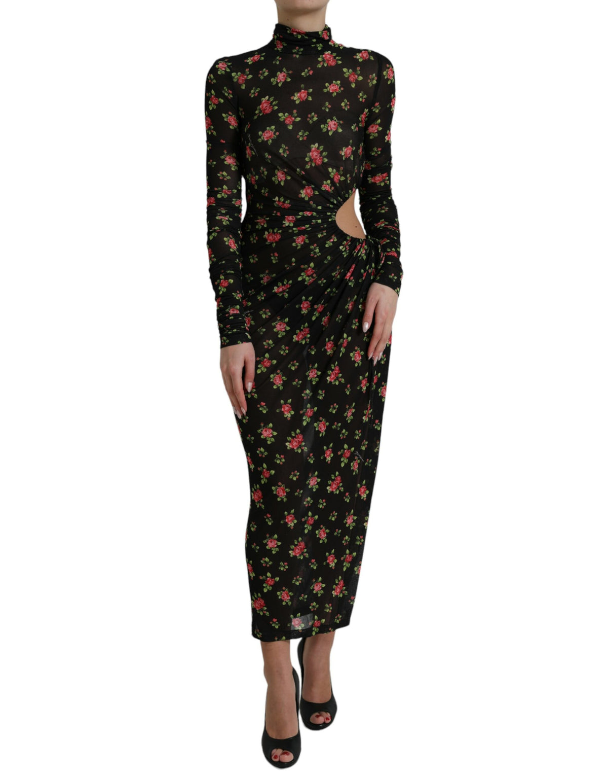 Dolce & Gabbana black floral cut-out sheath long maxi dress displayed on a hanger with intricate floral details and elegant design.