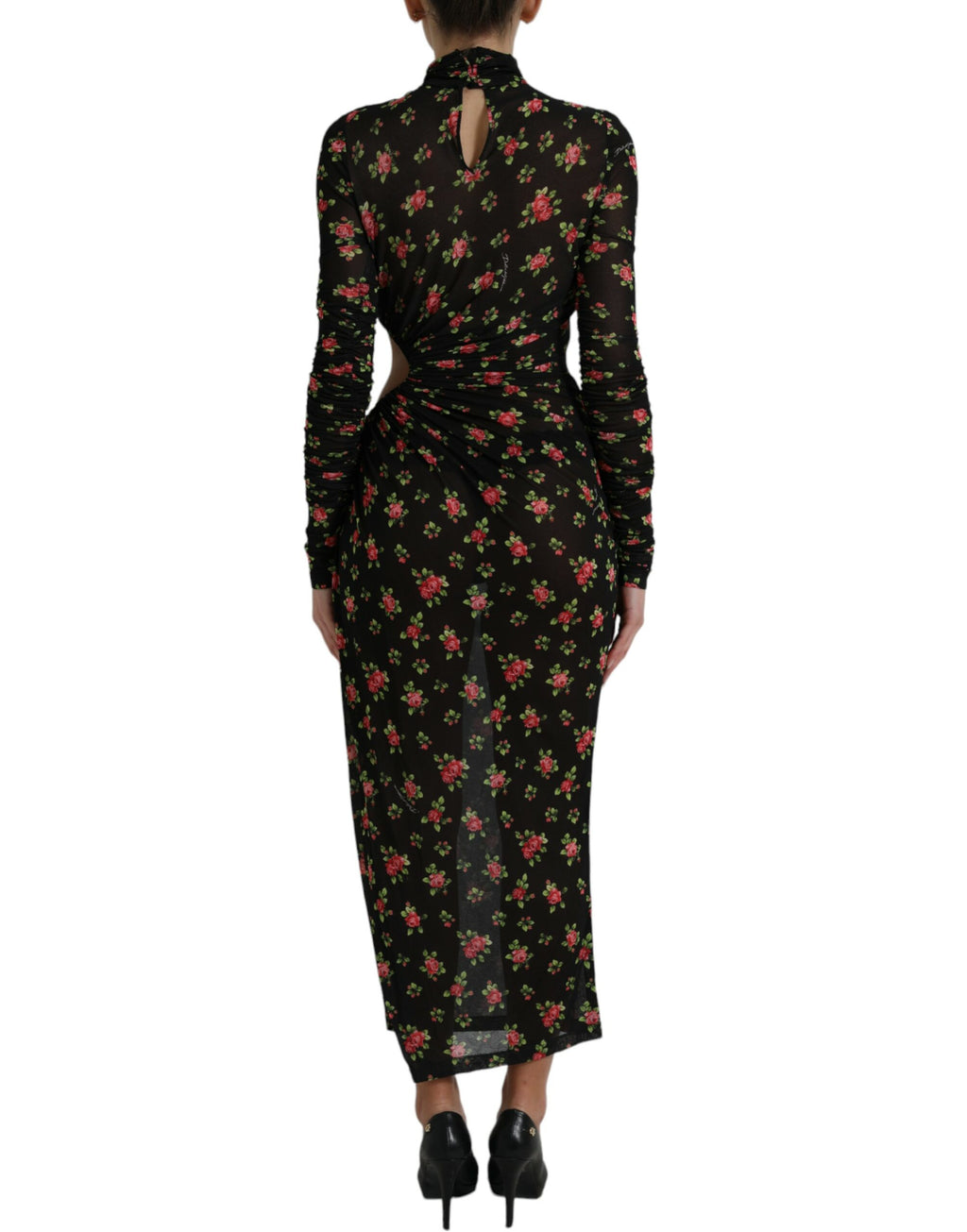 Dolce & Gabbana black floral cut-out sheath long maxi dress displayed on a hanger. Elegant evening wear with floral details and cut-out design.