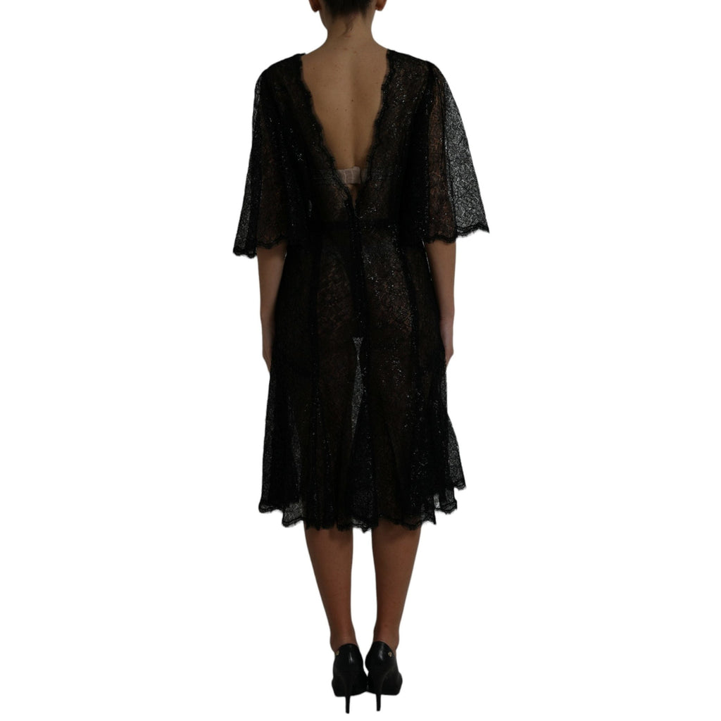 Dolce & Gabbana black floral lace sheer A-line midi dress with intricate lace details and flowing silhouette.