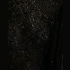 Black floral lace Dolce & Gabbana A-line midi dress with sheer fabric and elegant floral details, perfect for formal occasions.