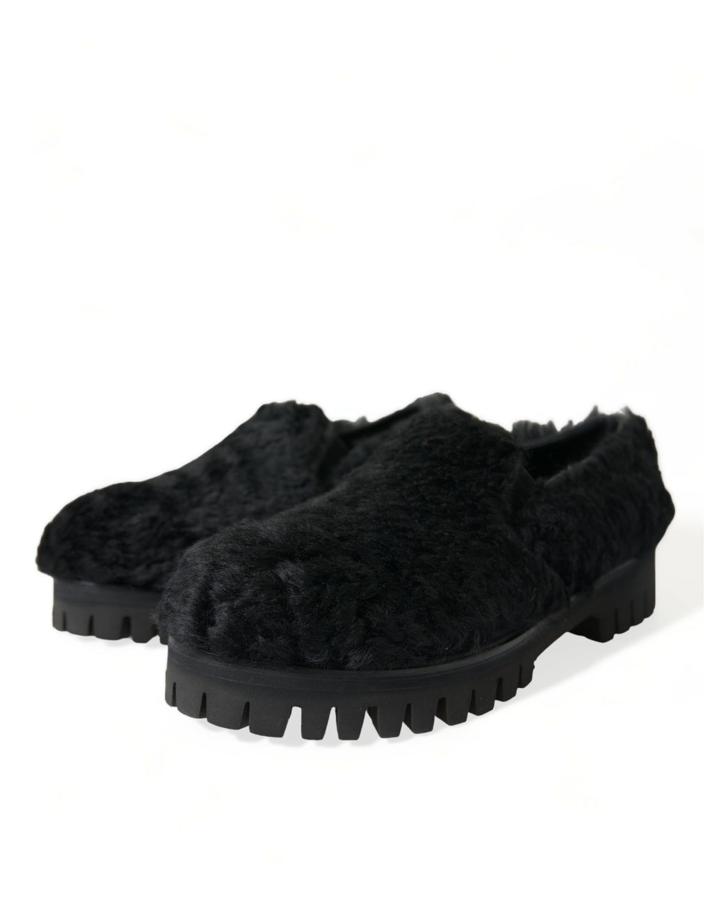 Dolce & Gabbana black fur leather slippers with dress shoe style, featuring sleek design and luxurious textures.