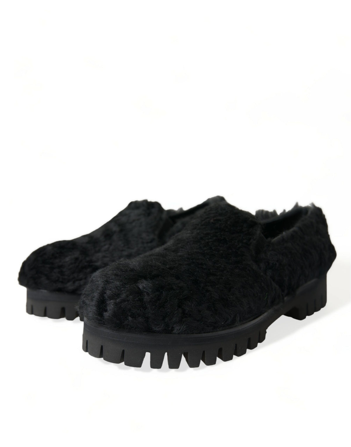 Dolce & Gabbana black fur leather slippers with dress shoe style, featuring sleek design and luxurious textures.