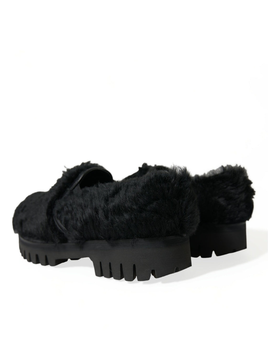 Dolce & Gabbana black fur leather slippers dress shoes with sleek design and luxurious detailing.