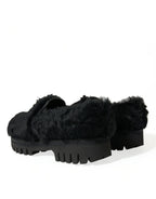 Dolce & Gabbana black fur leather slippers dress shoes with sleek design and luxurious detailing.