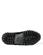 Dolce & Gabbana black fur leather slippers dress shoes with sleek design and luxurious texture.