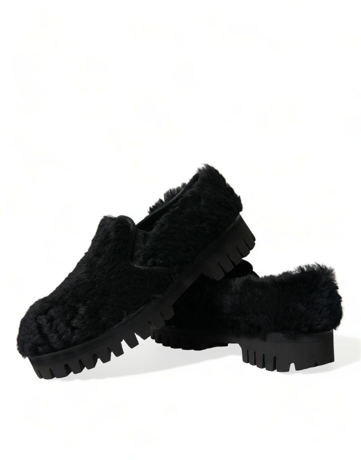 Dolce & Gabbana black fur leather slippers dress shoes with sleek design and luxurious texture, ideal for stylish formal wear.