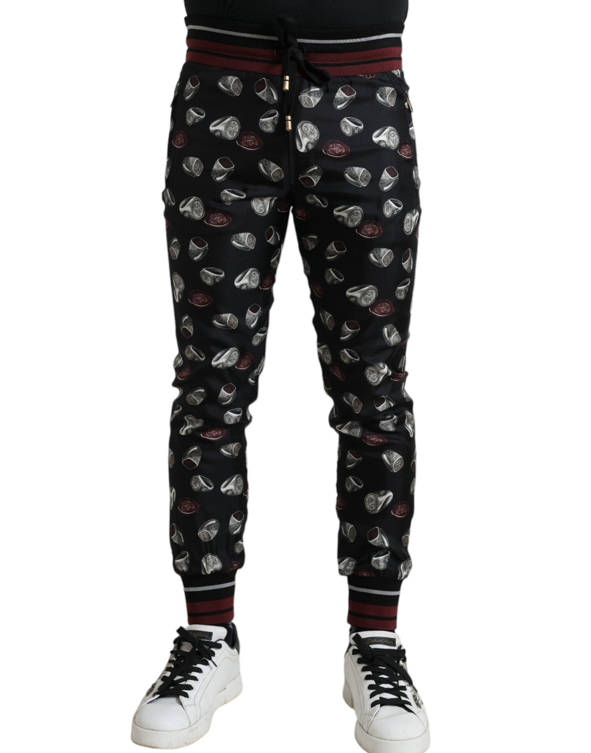 Dolce & Gabbana black silk jogging trousers with a relaxed fit and elastic waistband, stylish and comfortable for casual wear.