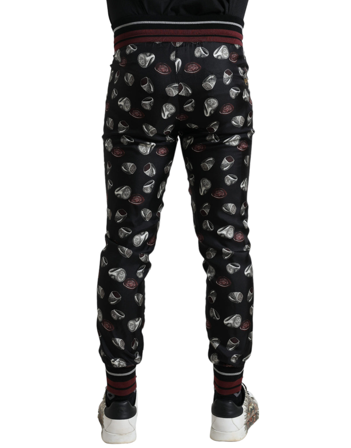 Dolce & Gabbana black silk jogging trousers with a relaxed fit and elastic waistband, stylish and comfortable for casual wear.