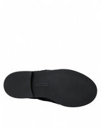 Dolce & Gabbana black leather lace-up derby dress shoes with luxurious fur accents and sleek design.