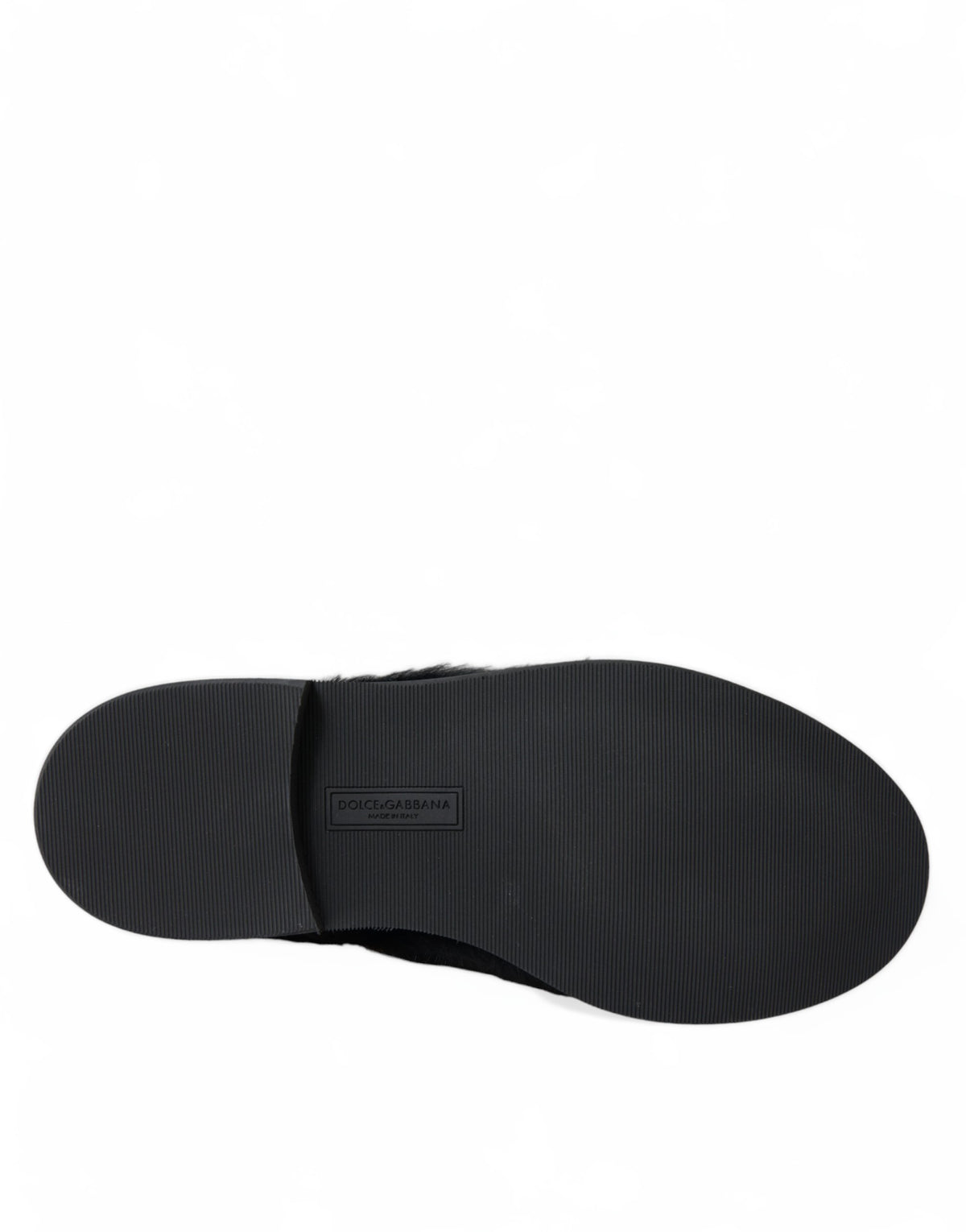 Dolce & Gabbana black leather lace-up derby dress shoes with luxurious fur accents and sleek design.
