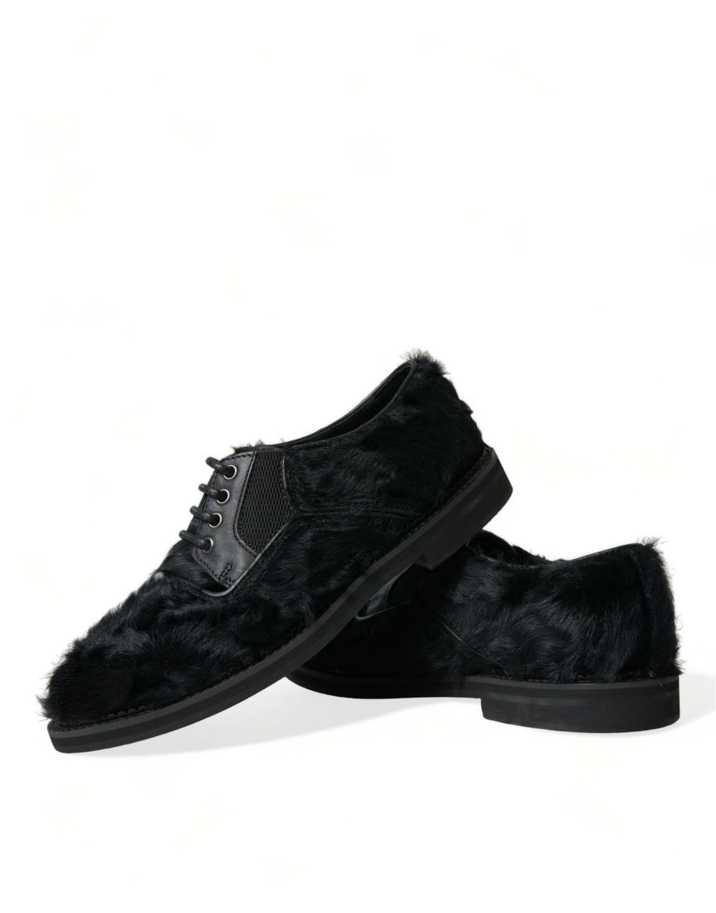 Dolce & Gabbana black leather lace-up derby dress shoes with fur accents, stylish and luxurious men's footwear.