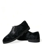 Dolce & Gabbana black leather lace-up derby dress shoes with fur accents, stylish and luxurious men's footwear.