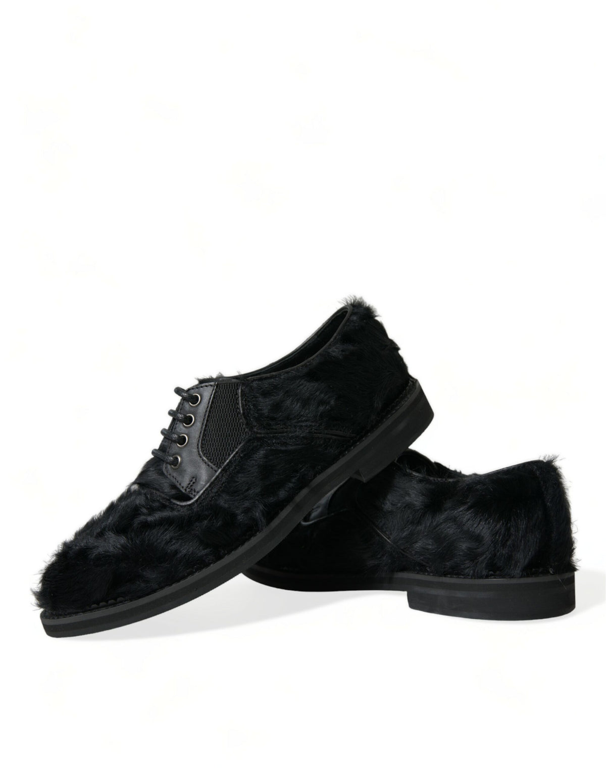 Dolce & Gabbana black leather lace-up derby dress shoes with fur accents, stylish and luxurious men's footwear.