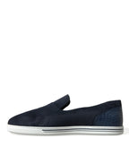 Dolce & Gabbana blue suede caiman loafers with classic slip-on design and detailed stitching, perfect for stylish casual wear.