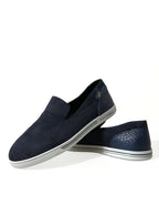 Dolce & Gabbana Blue Suede Caiman Loafers with classic slip-on design and sleek style on a white background.