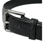 Dolce & Gabbana black exotic leather belt with silver metal buckle, stylish and luxurious accessory for men or women.