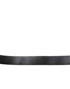 Dolce & Gabbana black leather belt with embellished engraved buckle, featuring detailed craftsmanship and stylish design.