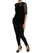 Dolce & Gabbana black floral lace blouse with short sleeves and delicate detailing, elegant and stylish for any occasion.