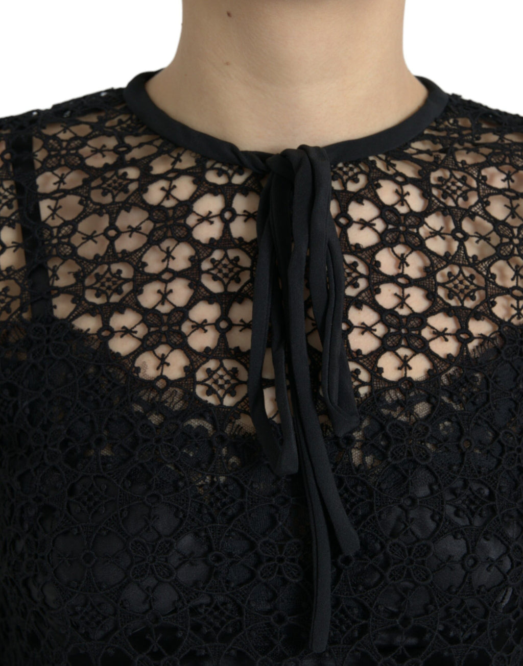 Black floral lace short sleeves blouse by Dolce & Gabbana, featuring intricate lace details and a classic feminine design.