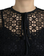 Black floral lace short sleeves blouse by Dolce & Gabbana, featuring intricate lace details and a classic feminine design.