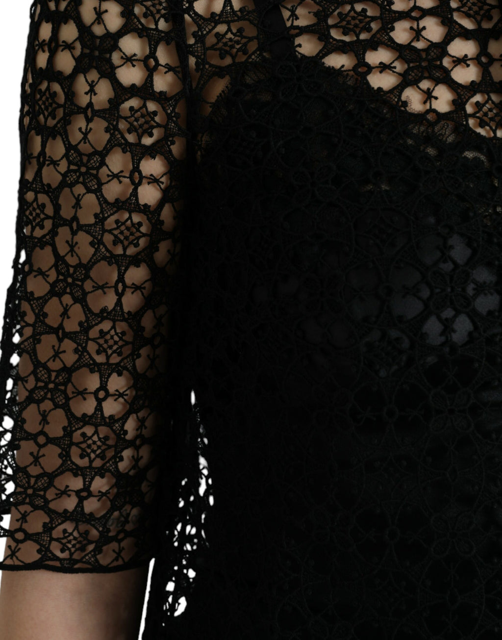 Dolce & Gabbana black floral lace short sleeve blouse top with delicate lace details and a feminine design.