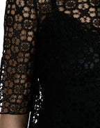 Dolce & Gabbana black floral lace short sleeve blouse top with delicate lace details and a feminine design.