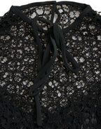 Dolce & Gabbana black floral lace short-sleeve blouse with delicate detailing and elegant fit.