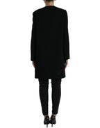 Dolce & Gabbana black floral wool jacket with button embellishments, featuring a tailored fit and elegant design.