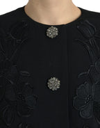 Dolce & Gabbana black floral wool jacket with button embellishments, showcasing a sophisticated design and elegant floral pattern.