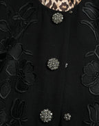 Dolce & Gabbana black floral wool jacket with button embellishments, stylish and elegant outerwear for women.