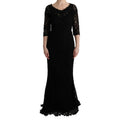 Dolce & Gabbana black floral ricamo sheath long dress with intricate embroidery and elegant silhouette.