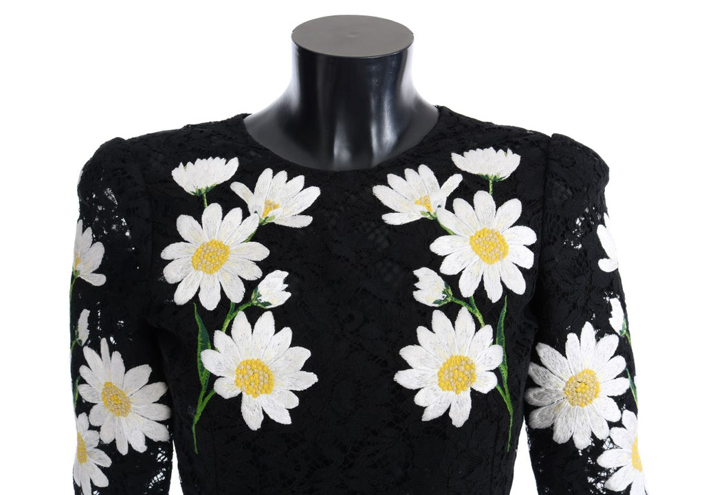 Black floral lace Dolce & Gabbana Sicily dress with chamomile print, elegant and detailed, shown on a model.