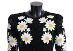 Black floral lace Dolce & Gabbana Sicily dress with chamomile print, elegant and detailed, shown on a model.