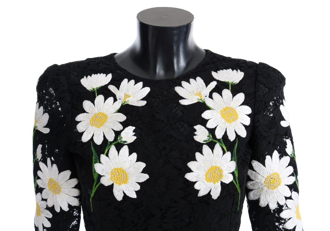 Black floral lace Dolce & Gabbana Sicily dress with chamomile print, elegant and detailed, shown on a model.