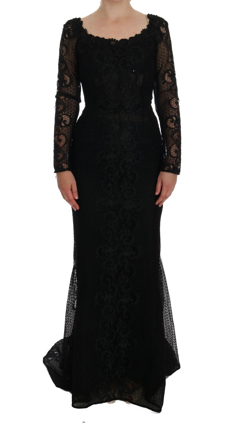 Dolce & Gabbana black floral sheath dress displayed on a hanger, showcasing elegant floral pattern and fitted silhouette.