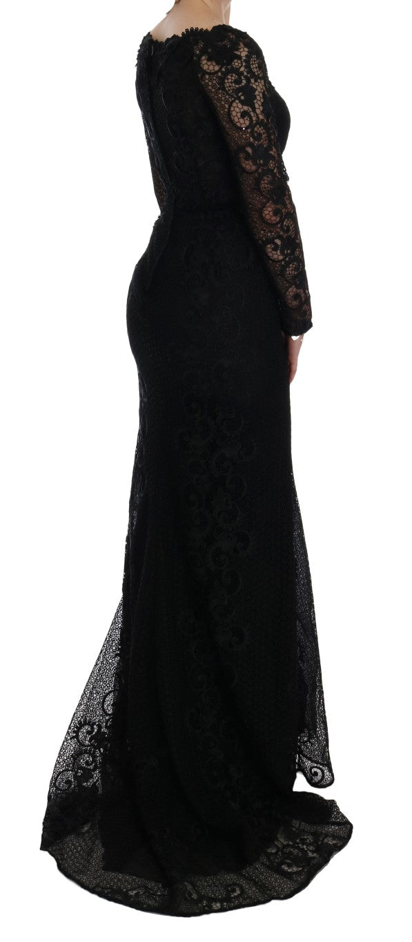 Elegant black floral Dolce & Gabbana sheath dress displayed on a hanger with detailed floral embroidery and fitted silhouette.