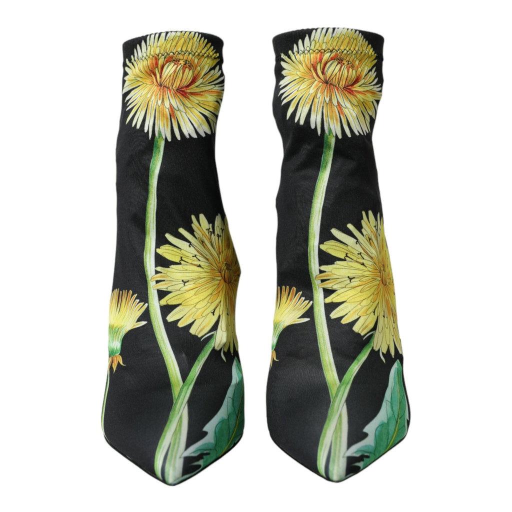 Dolce & Gabbana black floral jersey stretch ankle boots with pointed toes and sleek design.