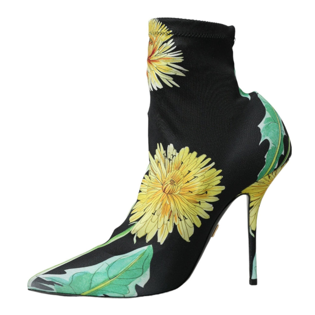 Black floral jersey ankle boots by Dolce & Gabbana with stretch fabric and sleek design.