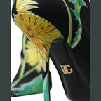 Black floral Dolce & Gabbana jersey stretch ankle boots with sleek design and pointed toes.