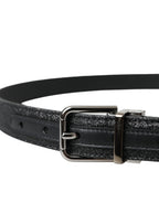 Dolce & Gabbana black leather belt with glitter accents and silver buckle, stylish accessory for fashionable outfits.