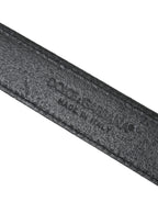 Dolce & Gabbana black leather belt with glitter accents and silver buckle, stylish accessory for women.