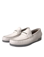 Dolce & Gabbana white and gray leather slip moccasin shoes with classic loafer design, featuring sleek stitching and polished finish.