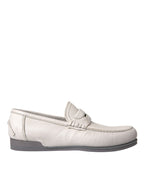 Dolce & Gabbana white and gray leather slip-on mocassin loafers with sleek design and stitching details.