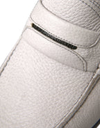Dolce & Gabbana white and gray leather slip-on mocassin shoes with loafers design on a plain background.