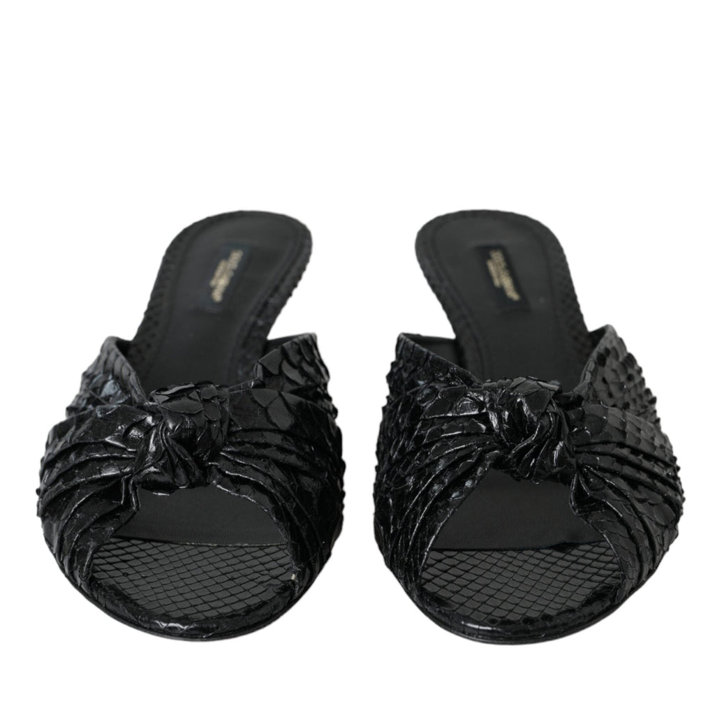 Black exotic leather Dolce & Gabbana heels slides shoes with sleek design and pointed toe, showcasing luxurious footwear style.