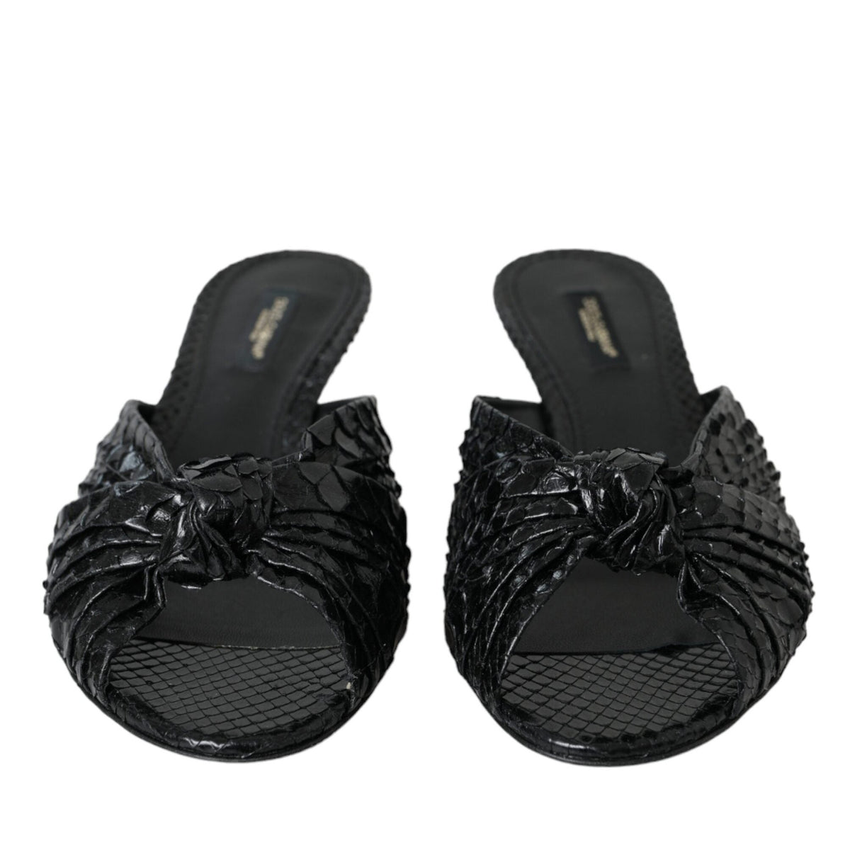 Black exotic leather Dolce & Gabbana heels slides shoes with sleek design and pointed toe, showcasing luxurious footwear style.