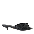 Dolce & Gabbana black exotic leather heels slides shoes with sleek design and luxurious texture.