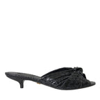 Dolce & Gabbana black exotic leather heels slides shoes with sleek design and luxurious texture.