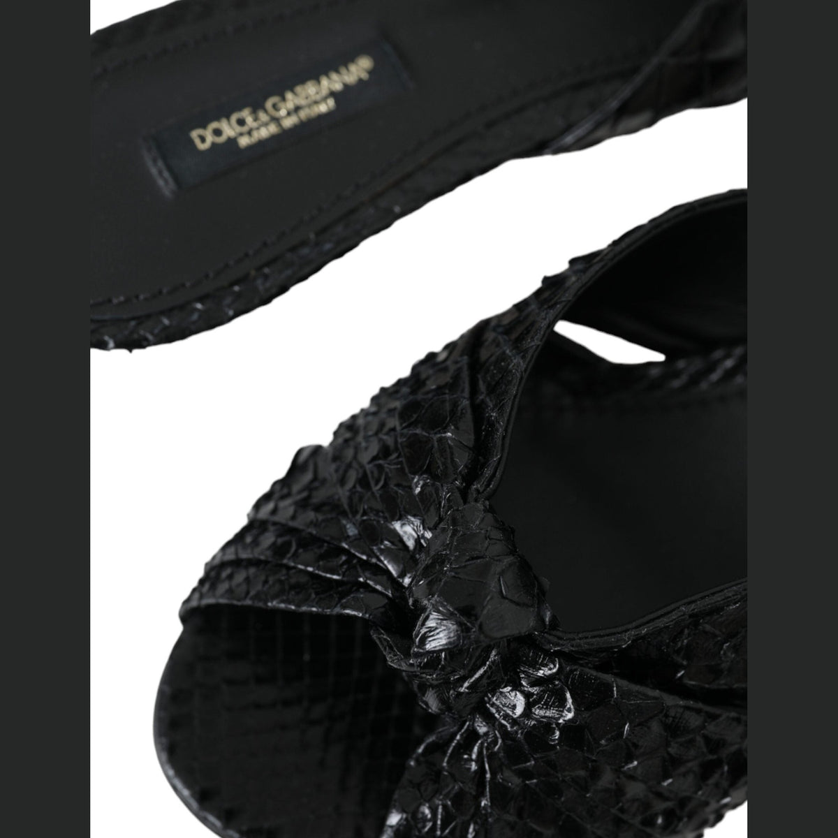 Dolce & Gabbana black exotic leather slide shoes with open toes and sleek design.